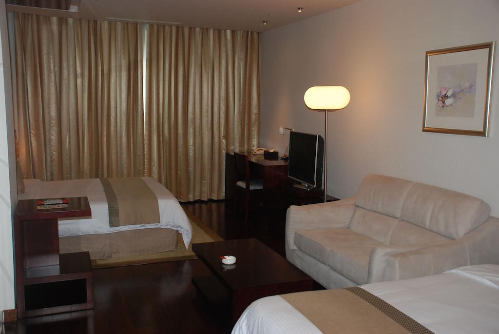 Ramada Plaza Shanghai Gateway Номер фото